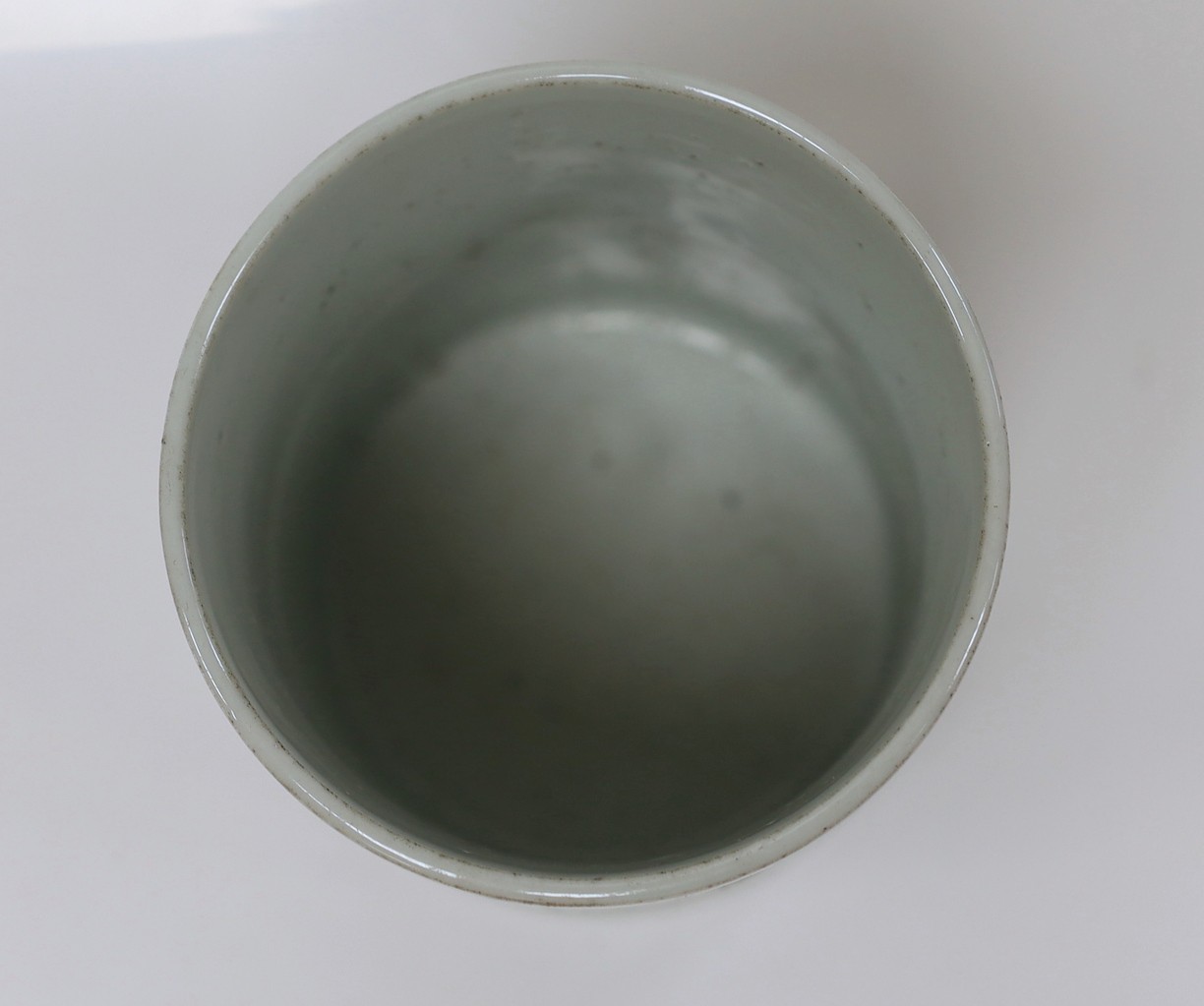 A cylindrical brush pot, 12.5cms high